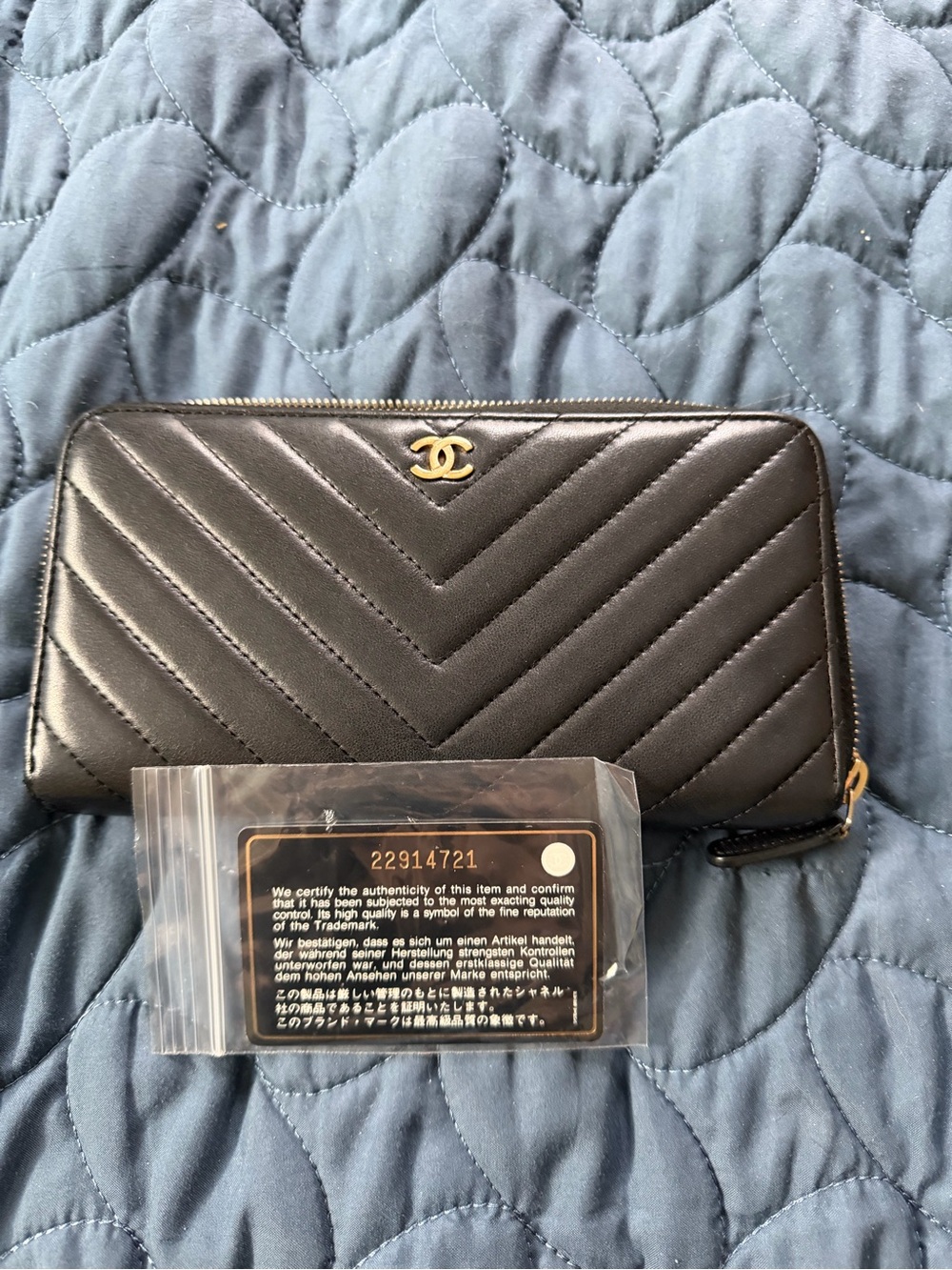 Authentic CHANEL Black Chevron Zip-Around Wallet with Gold CC Emblem